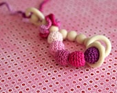 Teething toy rattle with crochet wooden beads and 3 wooden rings. Pink, lilac, purple