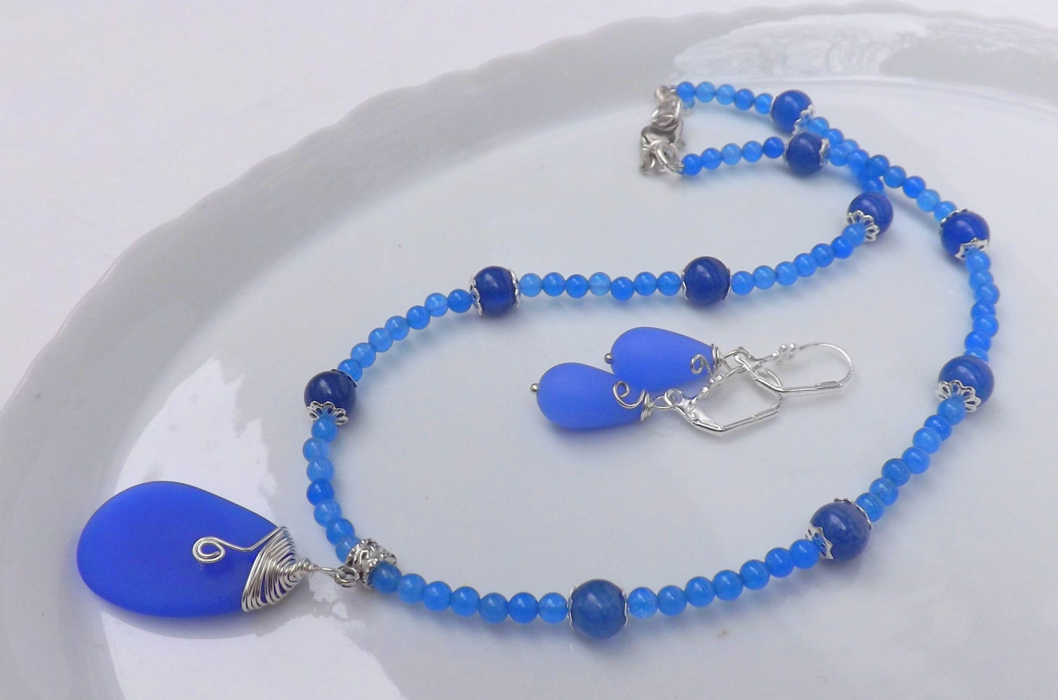 ON SALE Sea Glass Pendant and Earrings Set , Sky Blue, Opaque Sea Glass, Wire wrapped in Silver Wire , Handmade by Lyrisgems