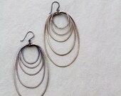 Vintage brass earrings.  Large sun spot earrings with silver ear wires.  Unique and modern handmade jewelry, stacking layered