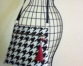 Messenger bag, sling bag, crossbody bag in houndstooth design with red tassel. On Sale.  Your Purchase Gives Hope. ON SALE