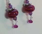 Purple and fuchsia swirl lampwork dangle earrings in silver with swarovski crystal dangles