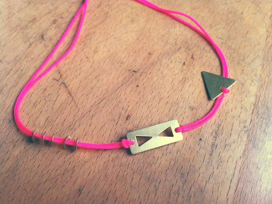 sunrise bracelet. hot pink nylon knotting cord and geometric gold necklace