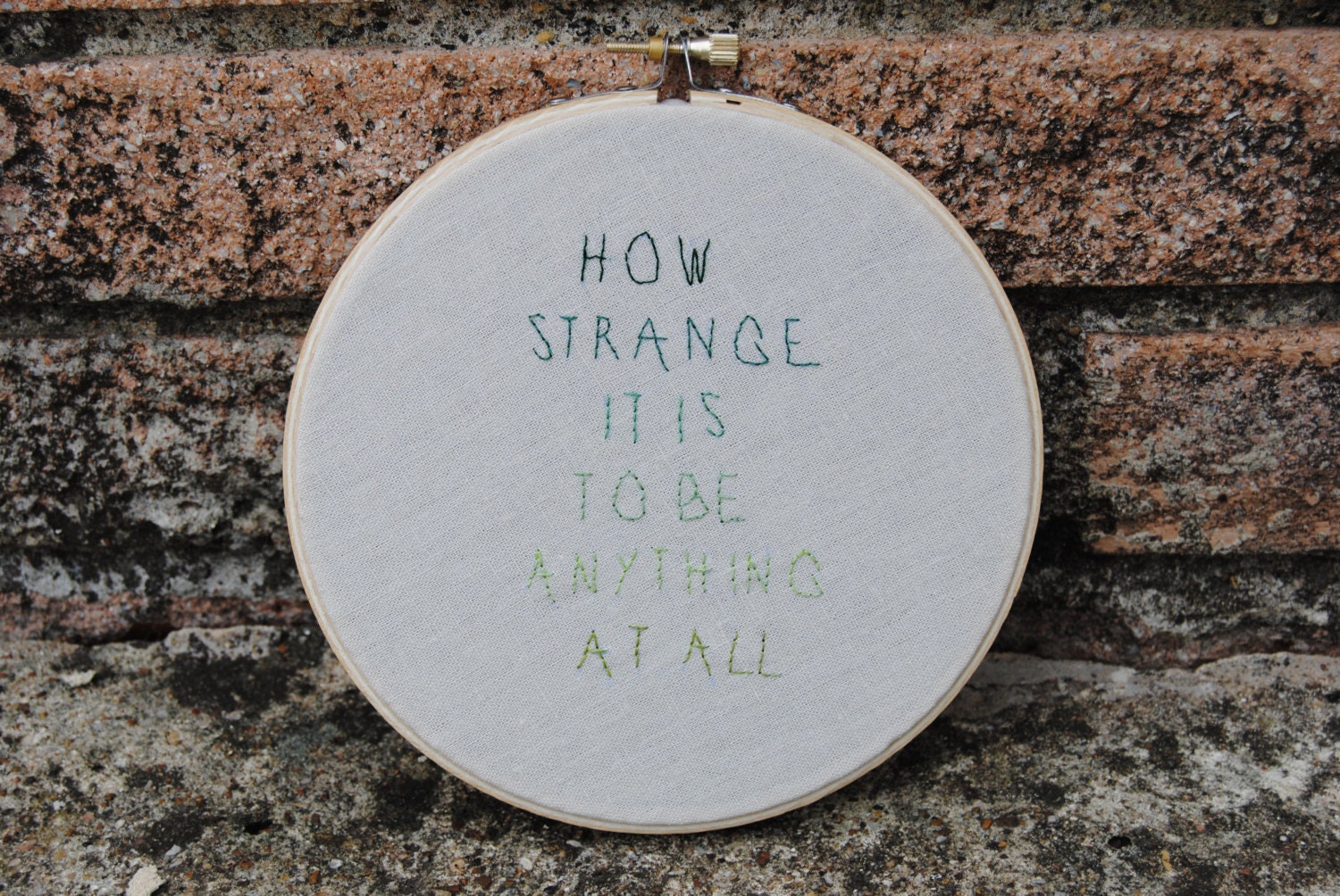 Embroidery Hoop Art - how strange it is to be anything at all - green ombre - 6 inch