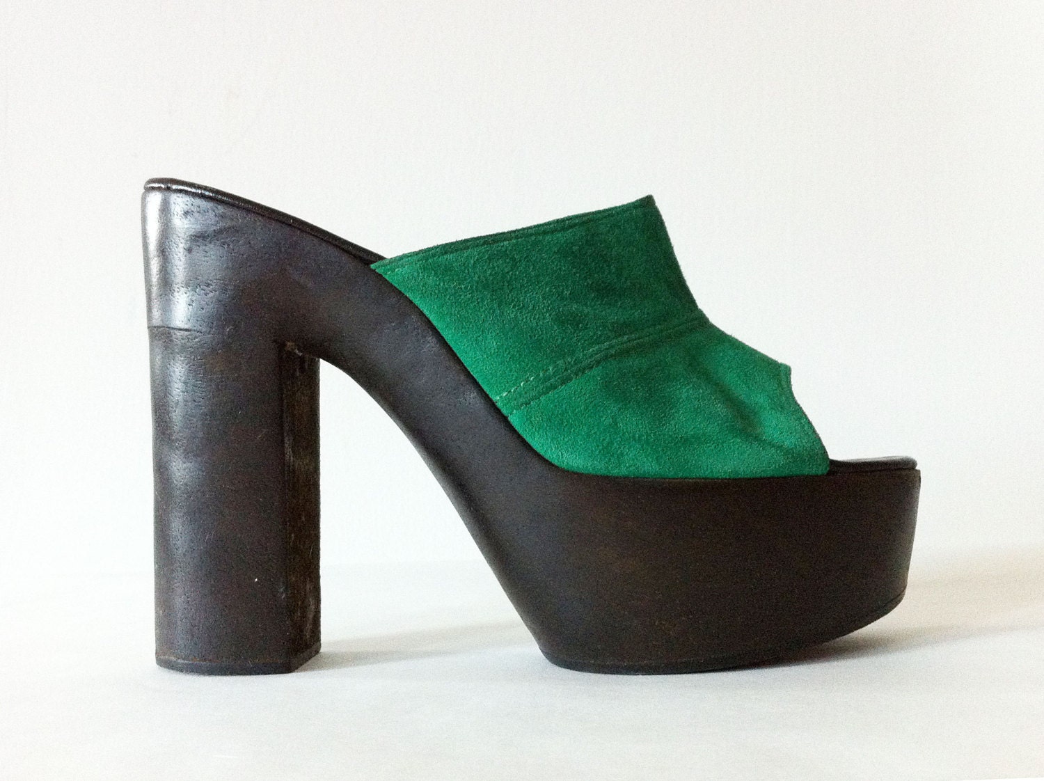 Vintage wooden platform heels in emerald green suede leather