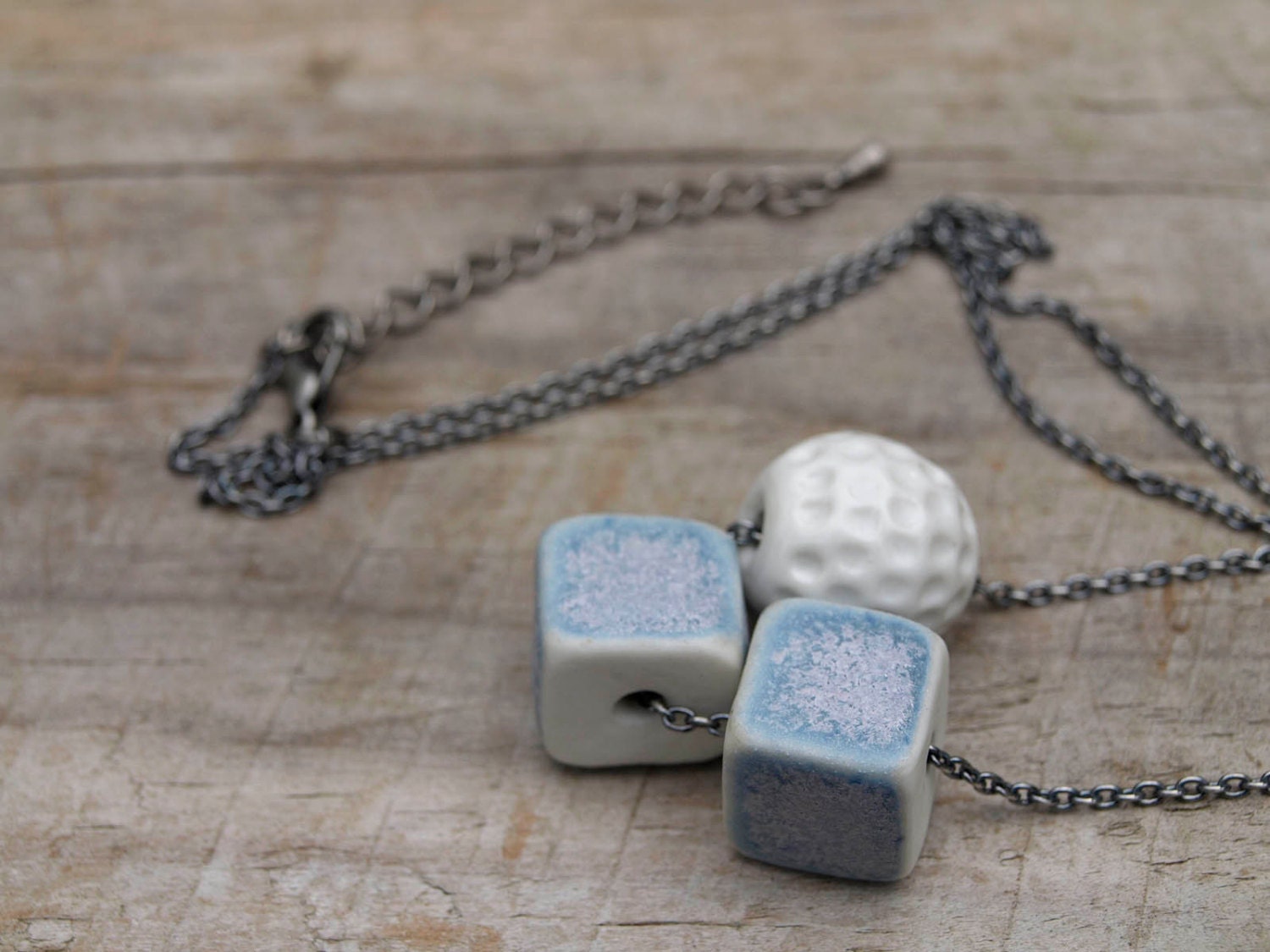 Handmade lilac and white porcelain necklace. Antique silver color chain