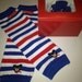 Red and Blue Striped Leg Warmers Packaged like a Cupcake