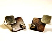 Elegant silver earrings with copper plate