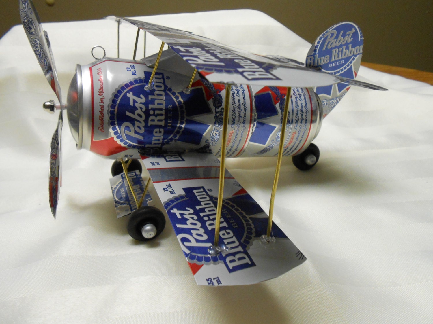 Recycled airplane made from cans