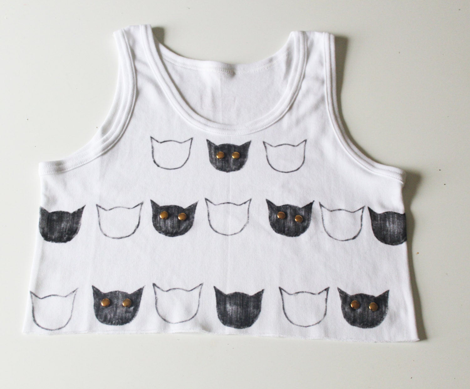 NEW IN: Cute White Crop Top with Cat Print and Stud Eye Detail
