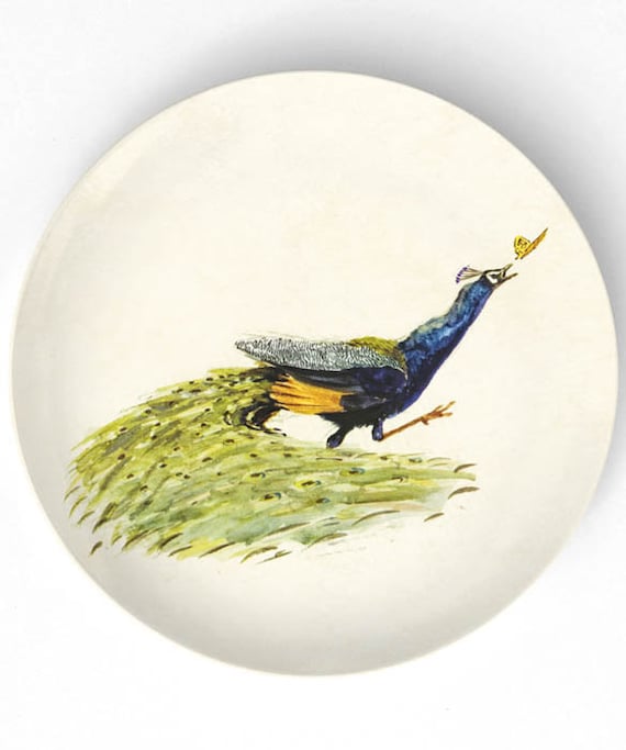 Peacock chasing a butterfly - on 10 inch Melamine Plate with softly aged off-white background