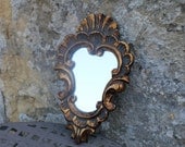 Small French vintage mirror with ornate gold frame