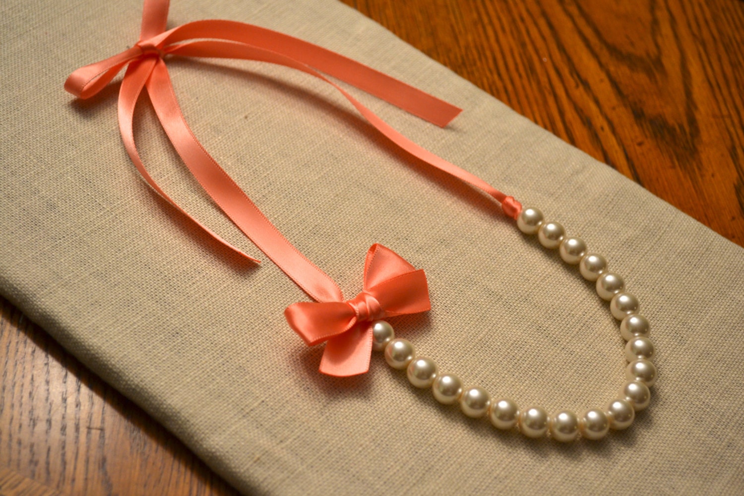 Nora: Beautiful Ivory Pearl with Coral Ribbon Necklace with Bow
