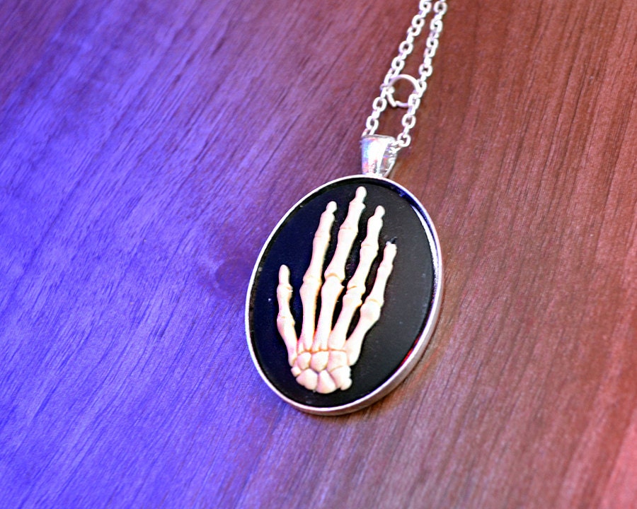 Cream and Black Skeleton Hand necklace pendant by Mortiis.M