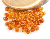 Natural Baltic Amber polished rounded beads - 50 pcs - Light cognac