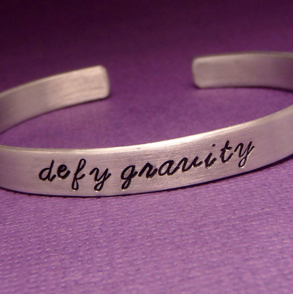 Wicked Inspired - Defy Gravity - A Hand Stamped Aluminum Bracelet