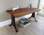 Modern industrial coffee table or bench featuring reclaimed chestnut barnwood top and antique school desk legs.