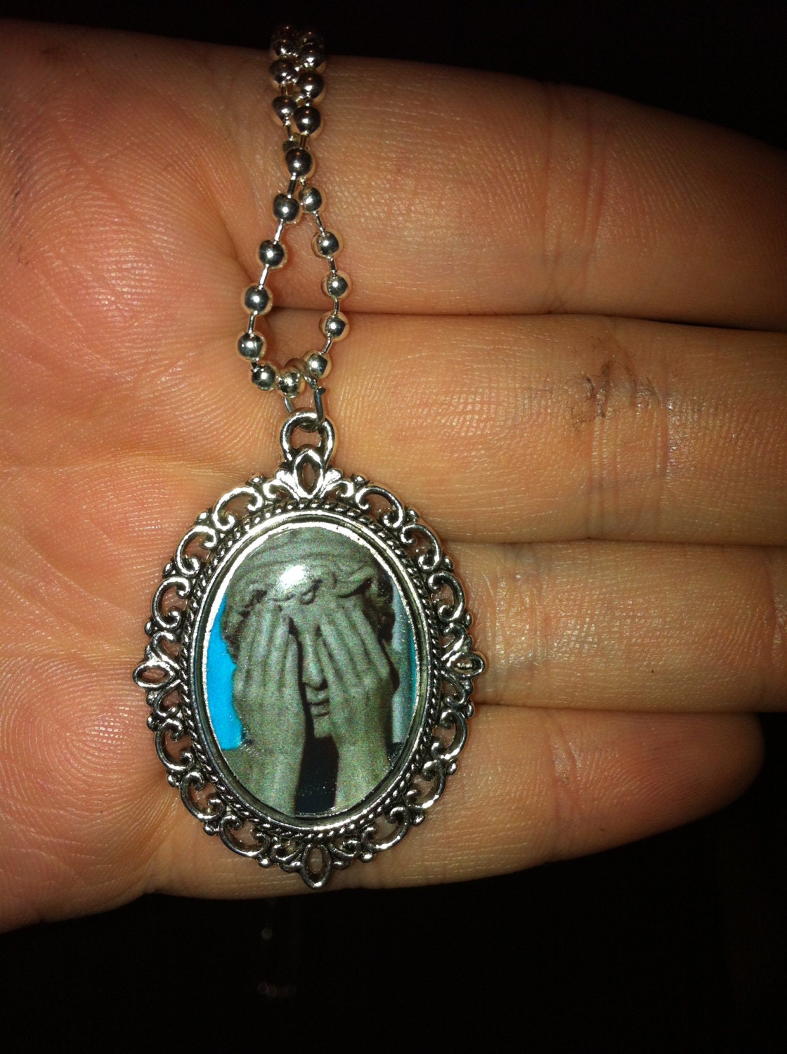 Dr Who Weeping Angel necklace