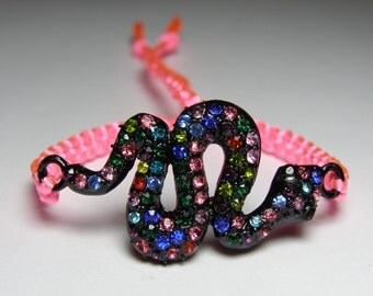 Snake bracelet with multicolored/rainbow rhinestones and neon pink macrame cord