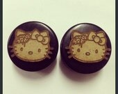 Zombie Hello Kitty Ear Plugs