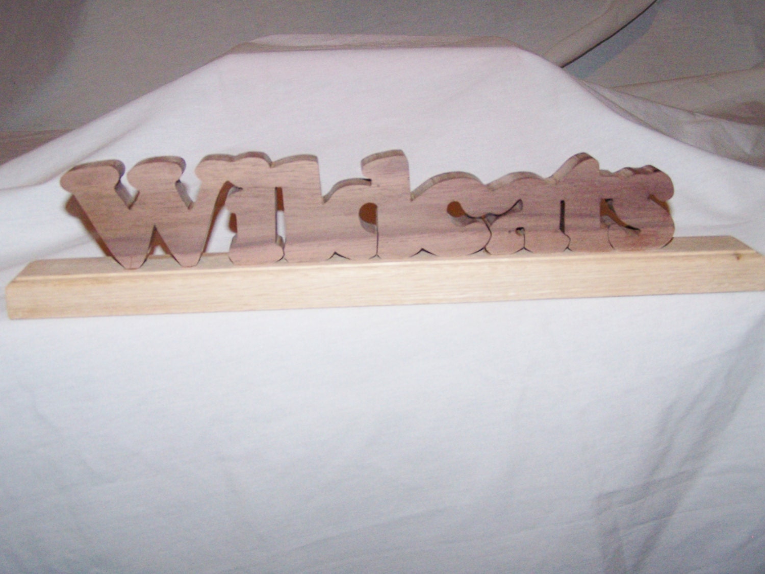 Custom made  sports team name made of oak or walnut