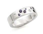 Titanium Stardust Wedding Band with sapphires. Titanium Ring. Blue and white sapphires. Flush set.