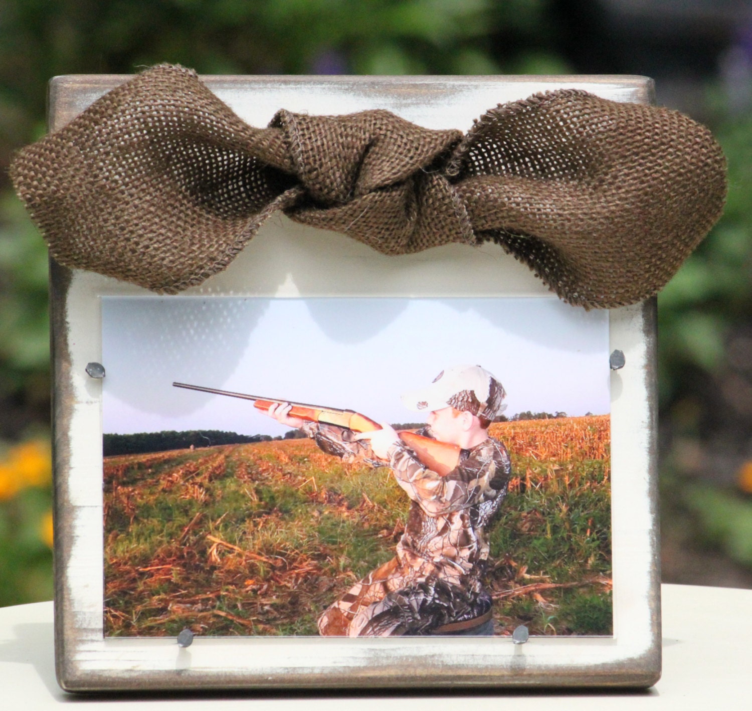 Shabby Chic White Distressed Wooden Frame with a Brown Burlap Bow
