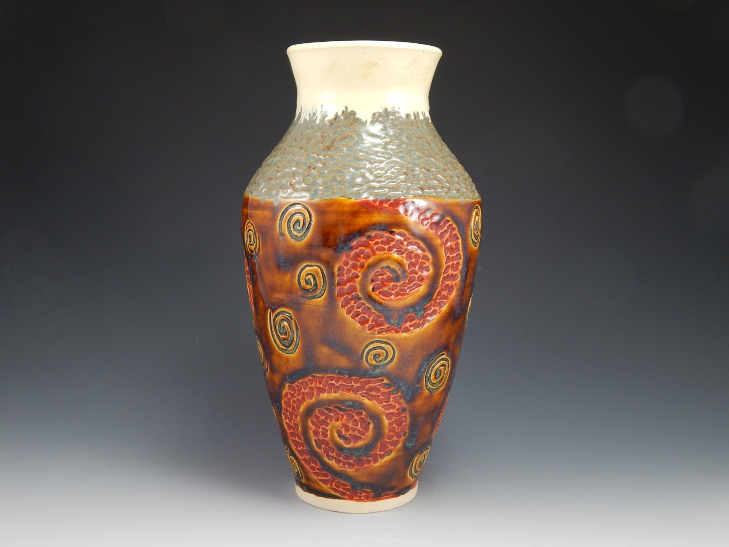 ceramic flower vase, red, wheel thrown, hand carved, spiral design