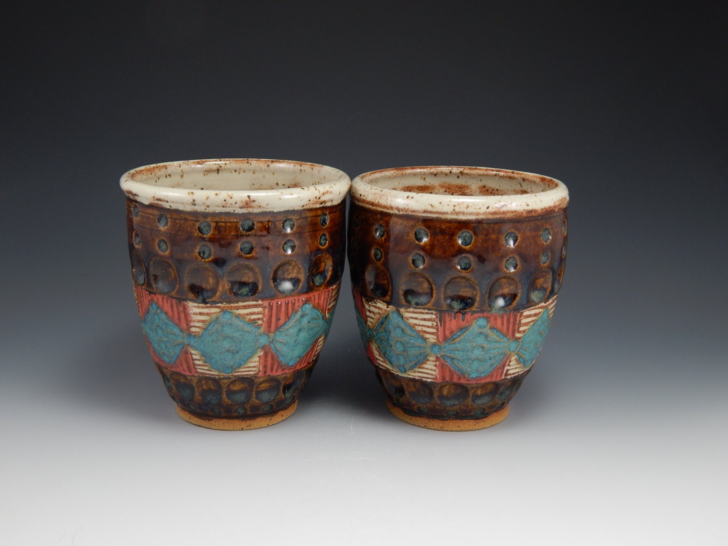 ceramic cups, hand carved, brown and teal, wheel thrown