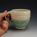 Ceramic tea cup, teal, hand thrown, carved wave design, nautical pottery