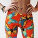 Joyful Orange Women Leggings with Colorful Spring Butterfly Pattern
