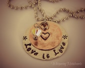 LOVE IS LOVE Hand stamped metal necklace -  hammered with Swarovski clear crystal