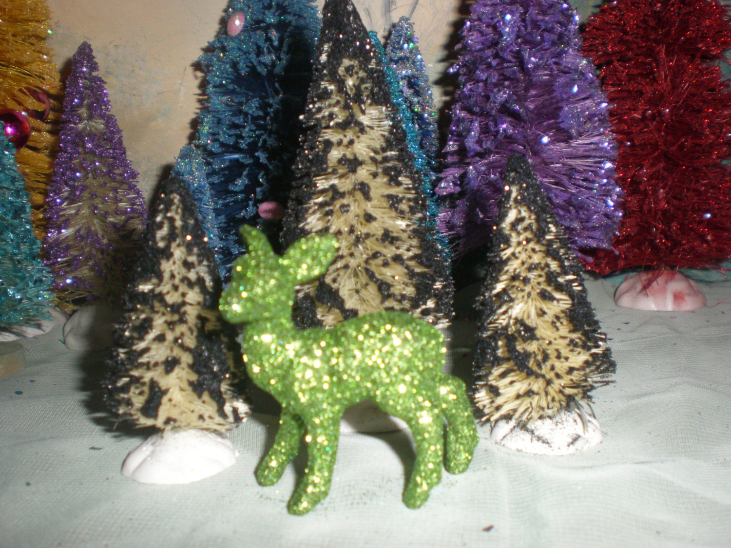 Scene Set: Hand dyed white bottle brush trees frosted in Black glitter (3in, 3in, 4in) and spring green glittered doe (2in)