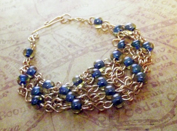 Womens gold chain infinity link metal copper wire topaz blue czech glass beaded intricate multi strand casual dressy keepsake wide bracelet
