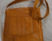 upcycled vintage camel color leather jacket to cross body messenger bag mod vintage sheet lining handmade