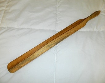 Beautiful exotic wood adult spanking paddle.