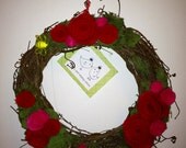 Grapevine wreath with handmade felt rosettes & Reindeer moss...