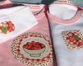 Handmade Strawberry design pink baby sleepsuit, onesie vest and knotted hat. Made in England, British, baby shower, newborn baby girl gift