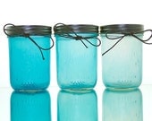 Stained glass mason jars in blue, red, purple, pink, yellow, green, brown, and black wedding centerpiece home decor