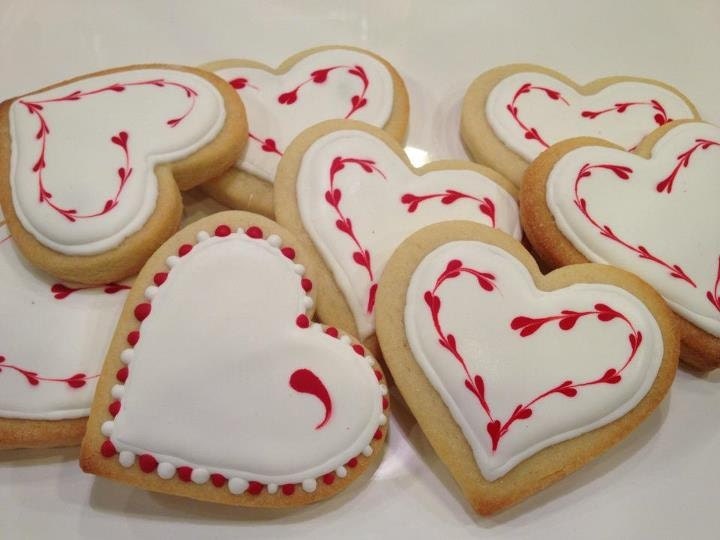 Love is in the air with these heart Valentine cookies (1dozen) heart sugar cookies. 