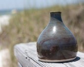 Small blue ceramic vase