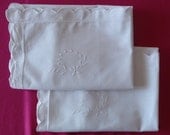 Antique linen: hemstitched and embroidered pair of white Belle Epoque cotton pillowcases