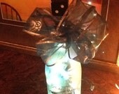 Liquor Bottle Light -blue lights w/ a black dice wine topper