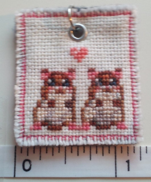 Hamsters in love cross stitched pendant
