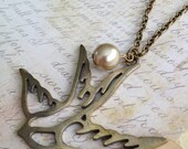 flying high. long charm necklace