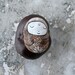 Jizo Bodhisattva with a Lotus Flower, painted on a dried Horse Chestnut (Aesculus hippocastanum)