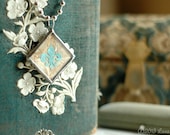 Aqua Blue Paper Fleur De Lis Soldered Charm Necklace Ivory Antiqued Silver
