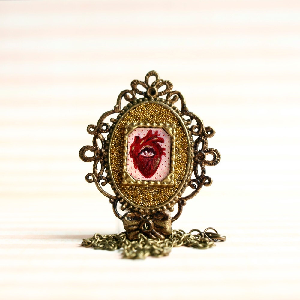 Lovers heart. strange eye candy. original cameo necklace with miniature painting. pop surrealism lowbrow art by KarolinFelix