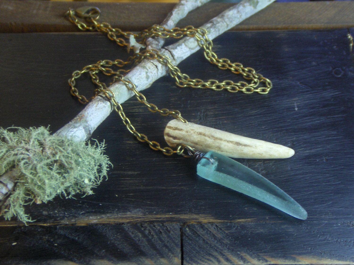 By land, By sea. deer antler tip and carved sea glass necklace