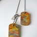 Wooden Recycled Skateboard Double Dog Tags Orange and Yellow Camouflage