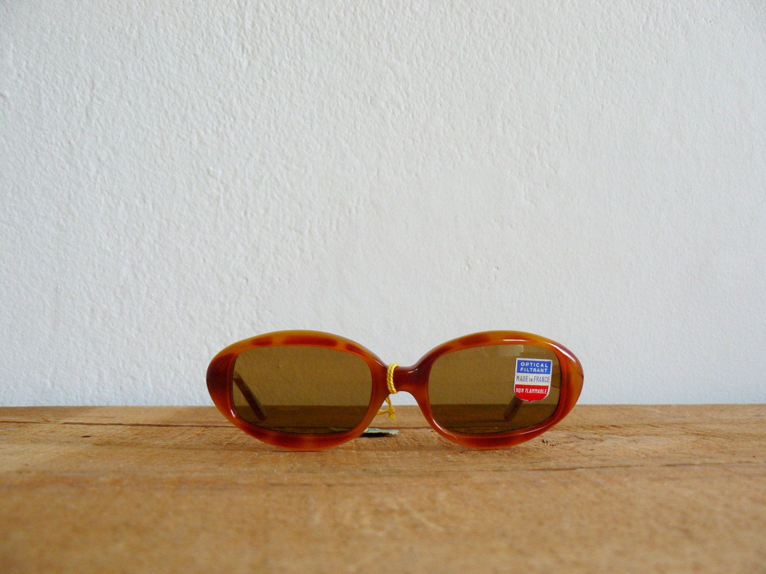 Vintage 1960s deadstock brown cat eye sunglasses. 60s eyewear